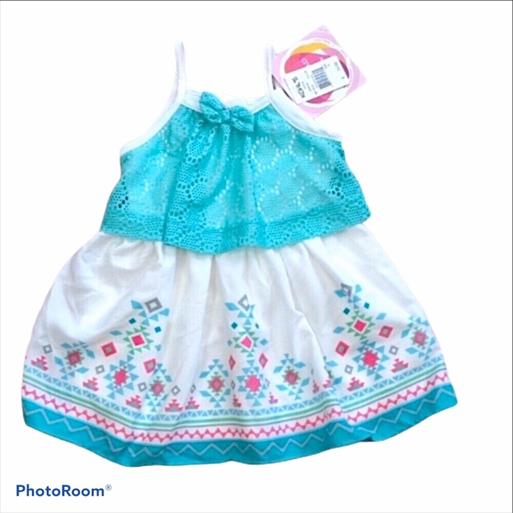 Youngland sundress with crocheted overlay top. Never used.